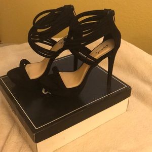 Black stiletto strap heels